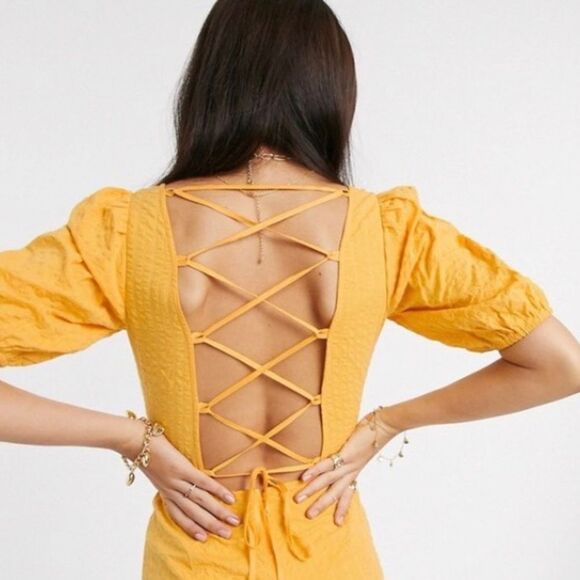 ASOS Yellow Seersucker Puff Sleeve Lace Up Back Romper - Picture 4 of 13